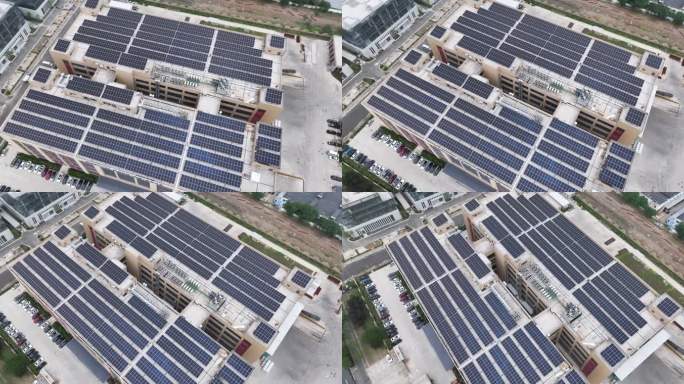 航拍工厂厂房屋顶太阳能光伏发电站