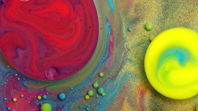 五彩斑斓的气泡的奇妙结构。混乱的运动。抽象的彩色油漆。顶部视图，