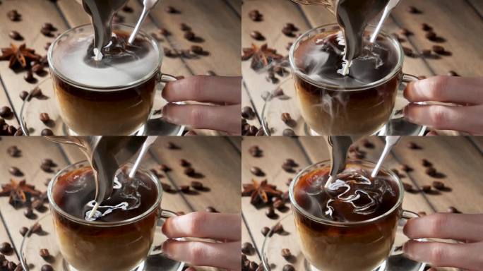 用蒸汽从咖啡壶倒进杯子里的咖啡