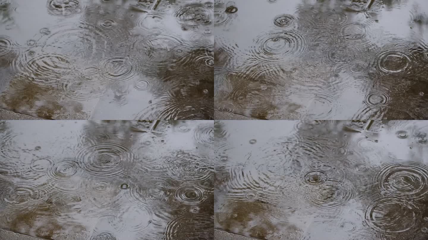 下雨天雨滴溅起的水花空镜