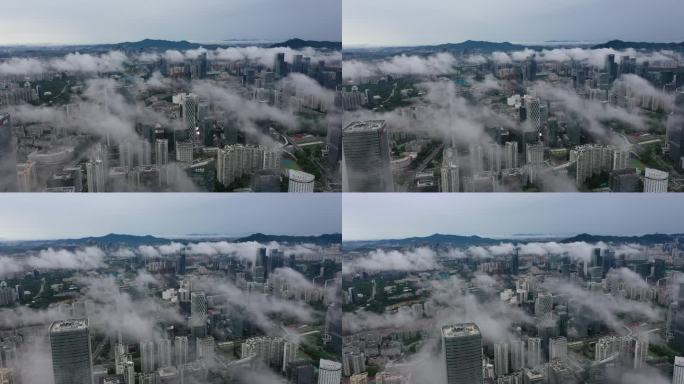 南山区城市上空低空云层航拍4k视频