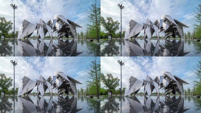城市广场钢铁雕塑蓝天白云延时摄影