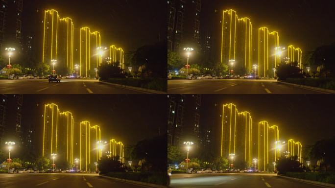夜晚城市建筑外墙的灯带灯光