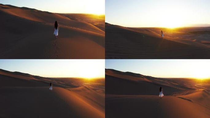 人物在沙漠上行走