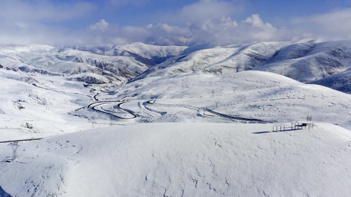 航拍西藏雪山冰天雪地公路