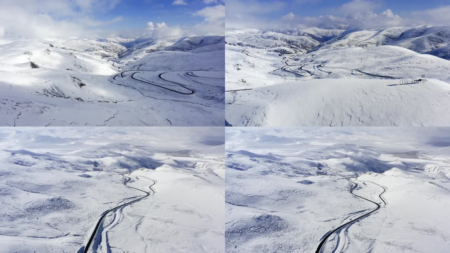 航拍西藏雪山冰天雪地公路