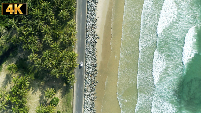 海南万宁石梅湾滨海旅游公路汽车行驶航拍