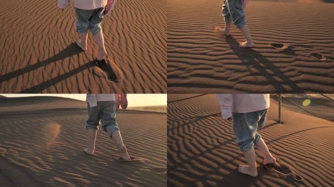 儿童在沙漠上行走