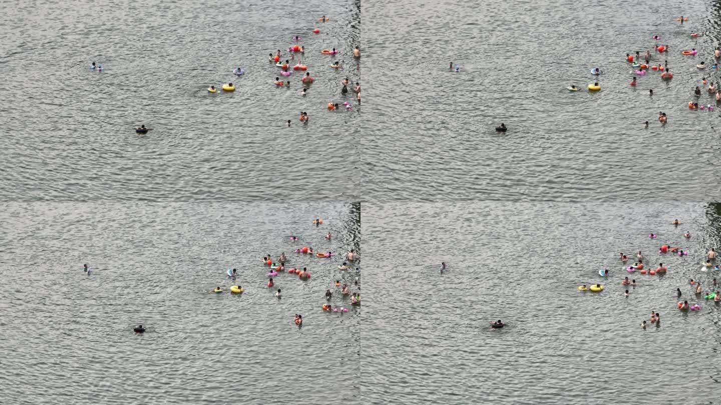夏天暑假孩子大人学生在河里江里游泳安全