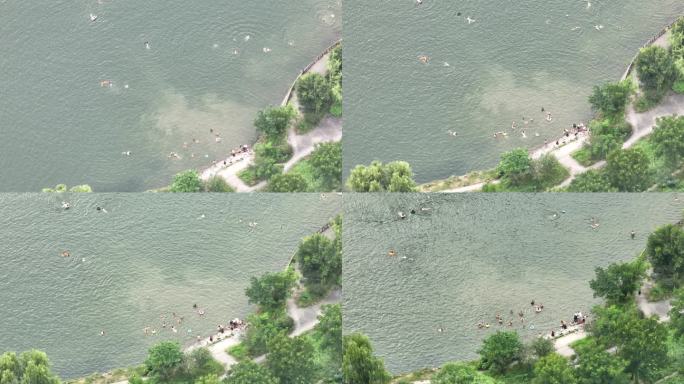 夏天暑假孩子学生大人江里河里游泳玩水安全