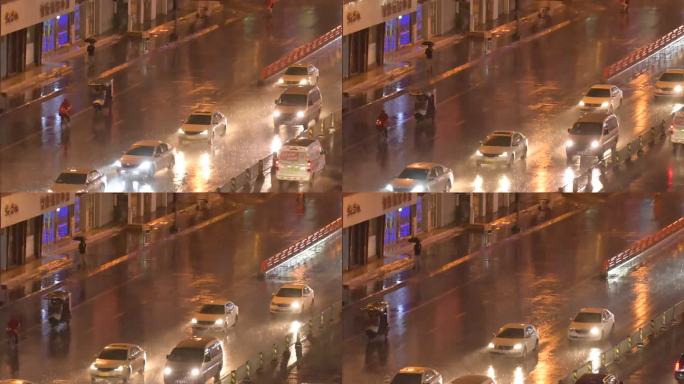 夜晚下雨天的城市街道车流