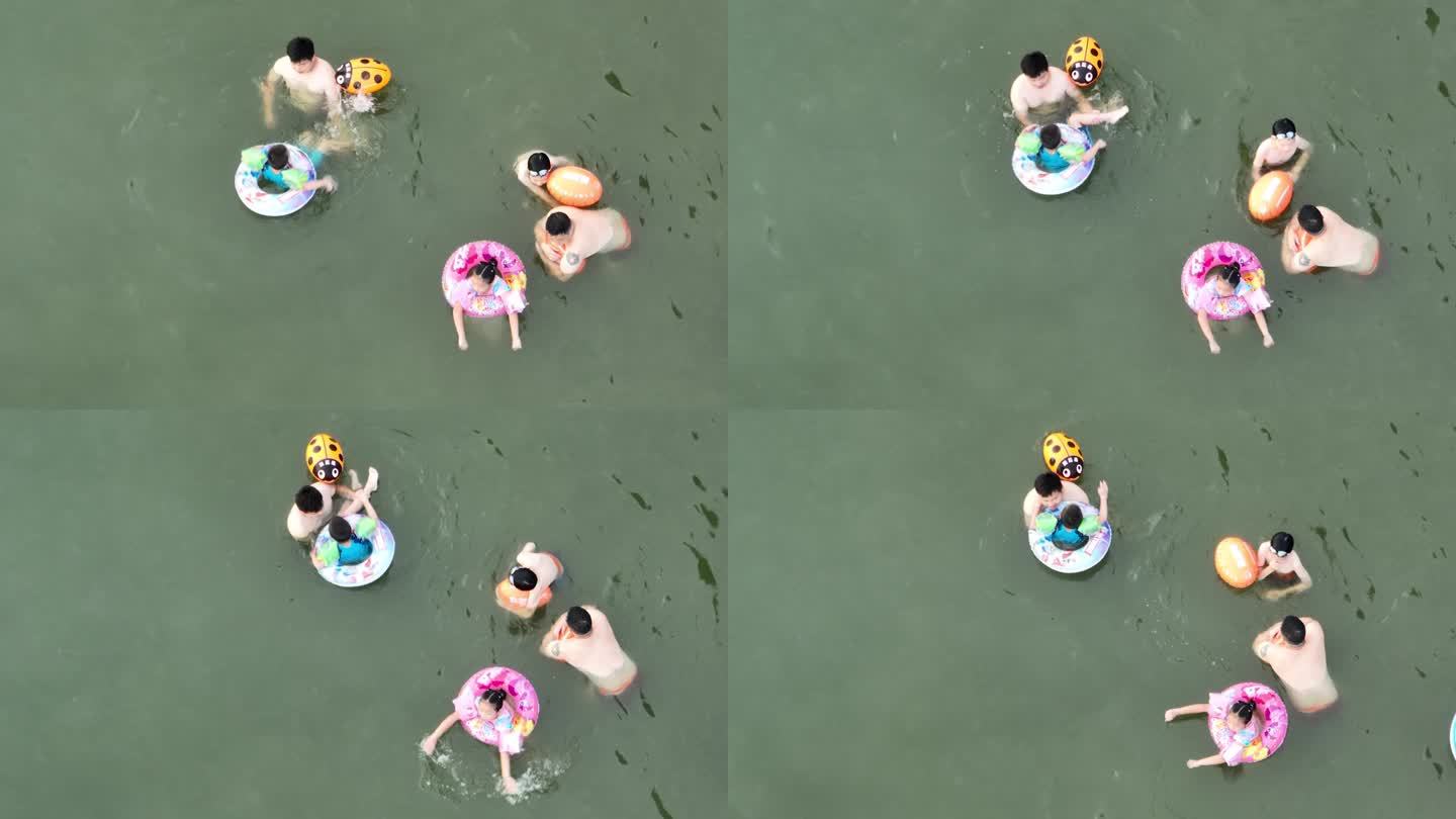 夏天暑假孩子学生大人野外水库山塘游泳玩水