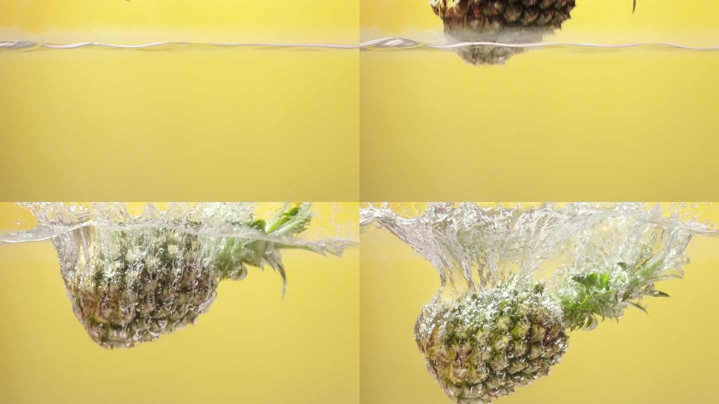 菠萝入水水果特写凤梨入水