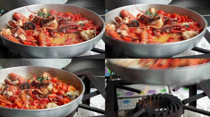 在平底锅里的西红柿意大利面食龙虾的制备