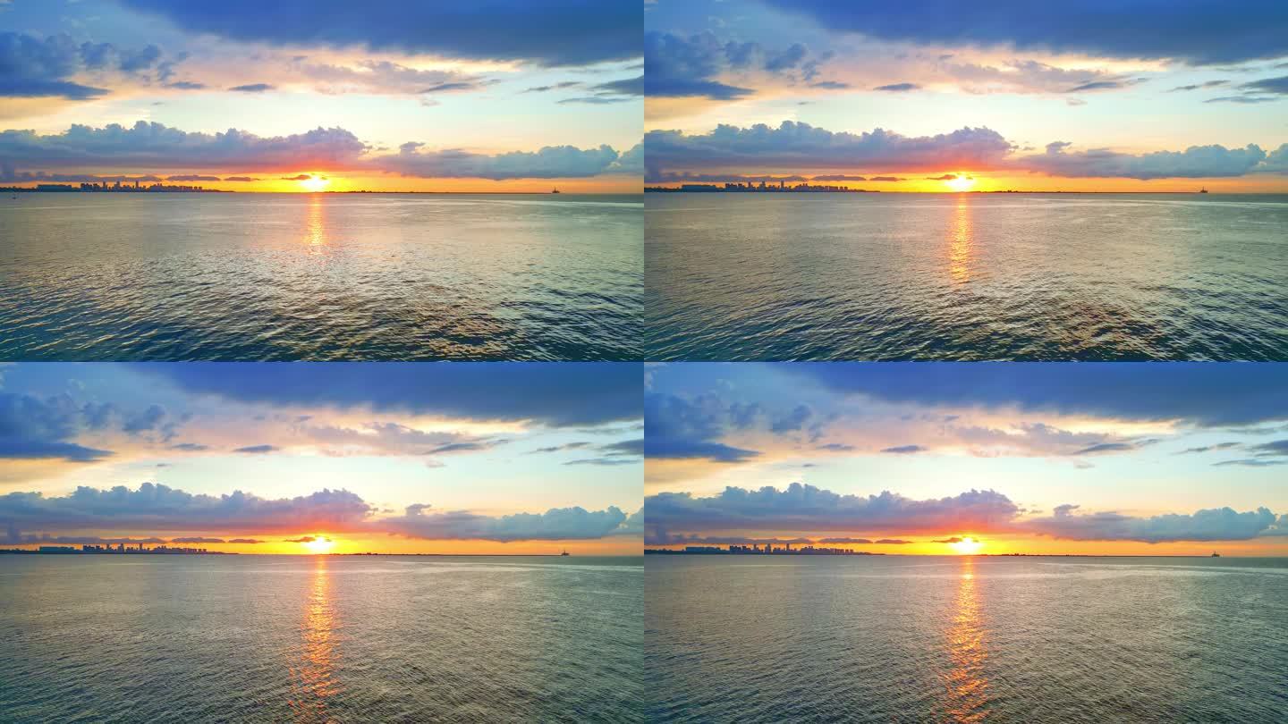 海南海口湾金色海洋日落晚霞4k航拍全景