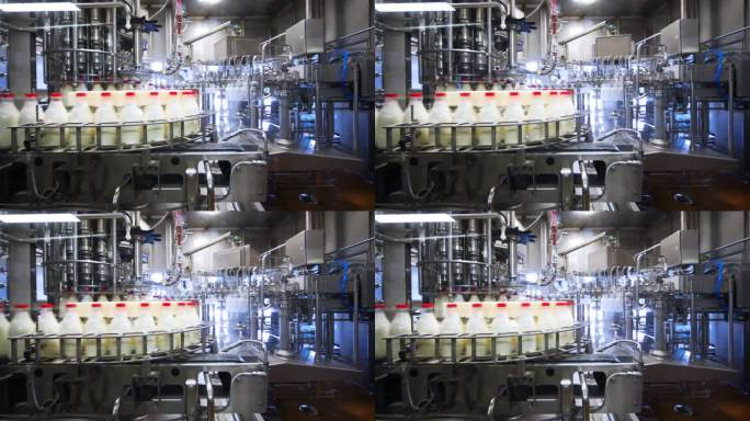 瓶而洗净、 晒干、 装满了牛奶和关闭在工厂式输送机帽