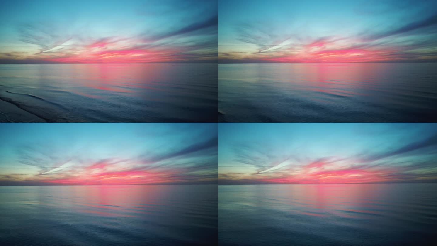 在美丽的落日下,鼓声在海上飘扬.空降无人机射击。太阳从海上升起。拉脱维亚波罗的海色彩艳丽的落日.