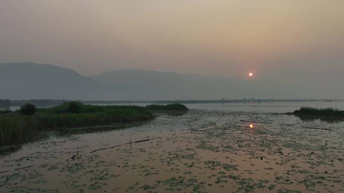 云南古镇河水夕阳航拍