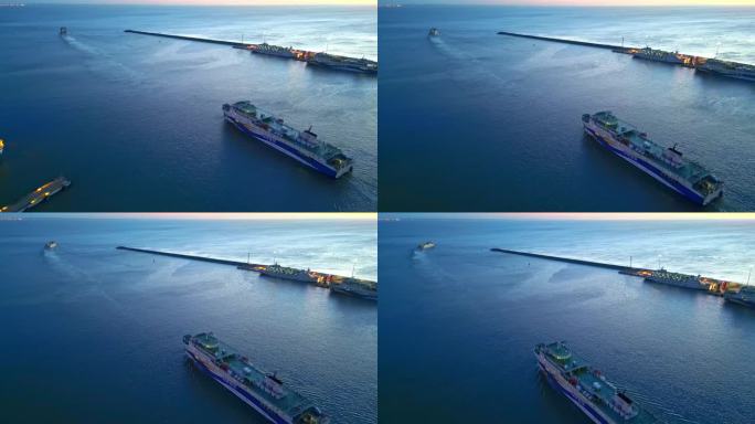 海南海口新海客运枢纽港口航拍货轮出港口