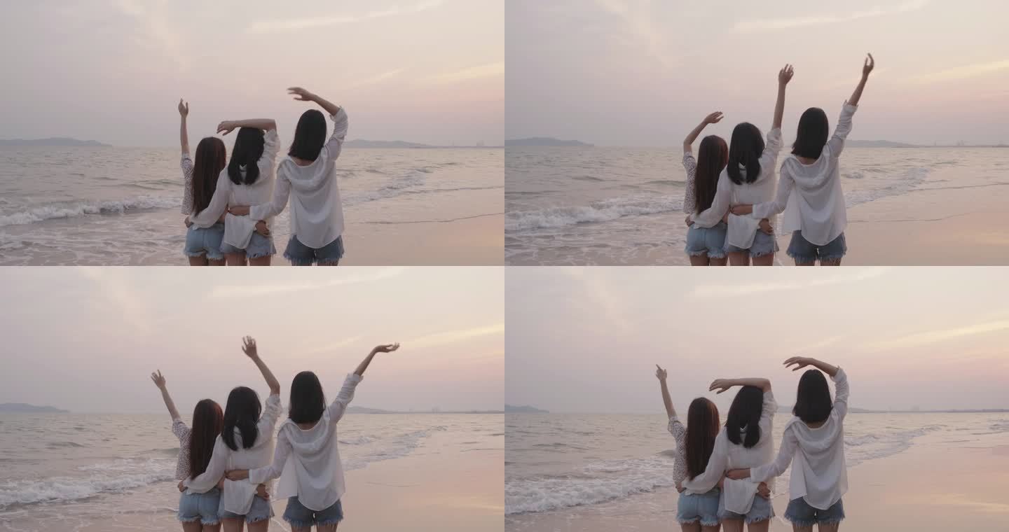 微笑快乐的亚洲朋友一群年轻女性在海滩上海边暑假日落剪影黄昏假期旅游享受生活周末活动人们的生活方式，慢