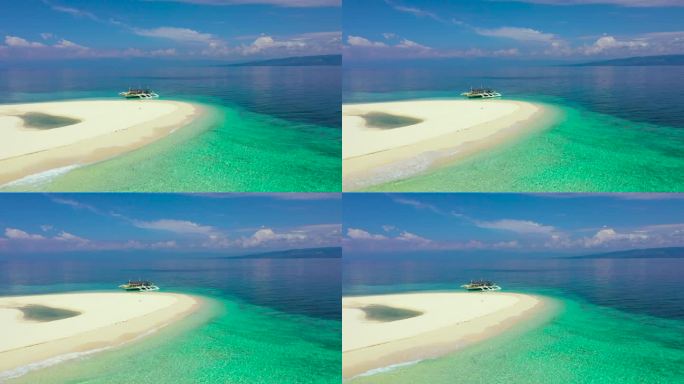 夏季海滩风景。热带岛屿景观，棕榈树与令人惊奇的蓝色大海。菲律宾Digyo岛