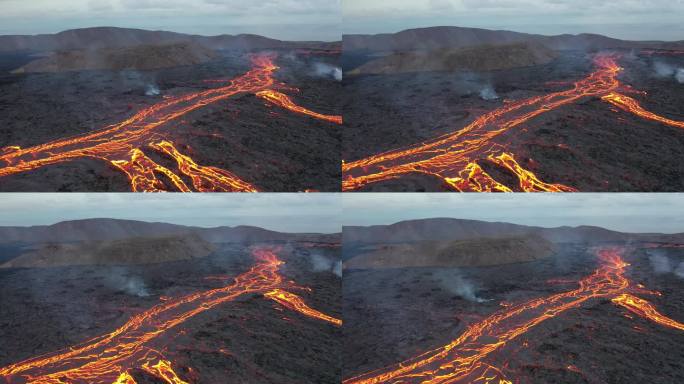 火山爆发后，炽热的火山熔岩在冰岛的一个山谷中蔓延开来.