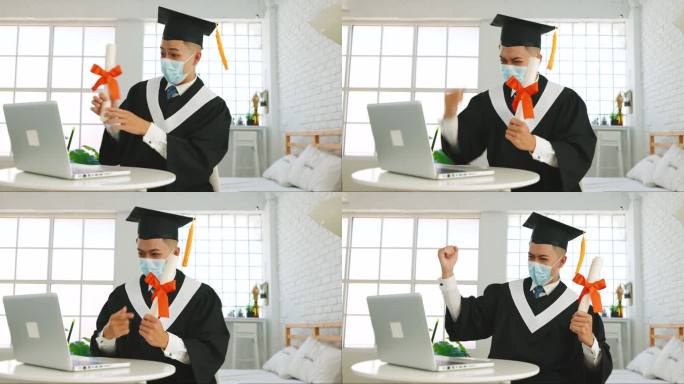 头戴医疗面具，头戴笔记本电脑，坐在办公桌前，拿着毕业文凭，喜庆成功的大学生或大学生