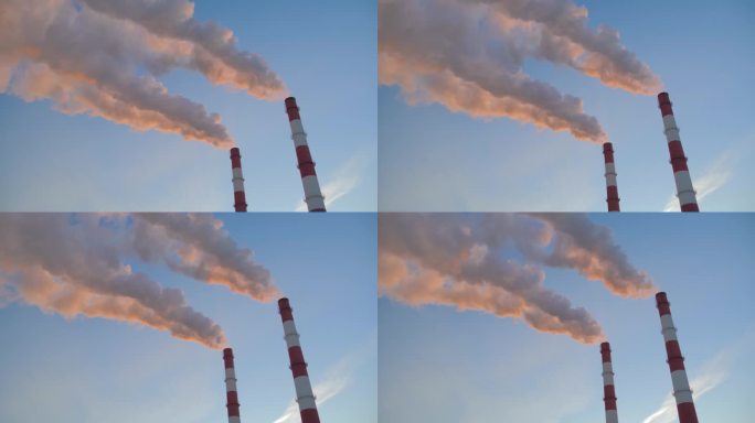 环境污染-工厂烟道向天空排放白烟