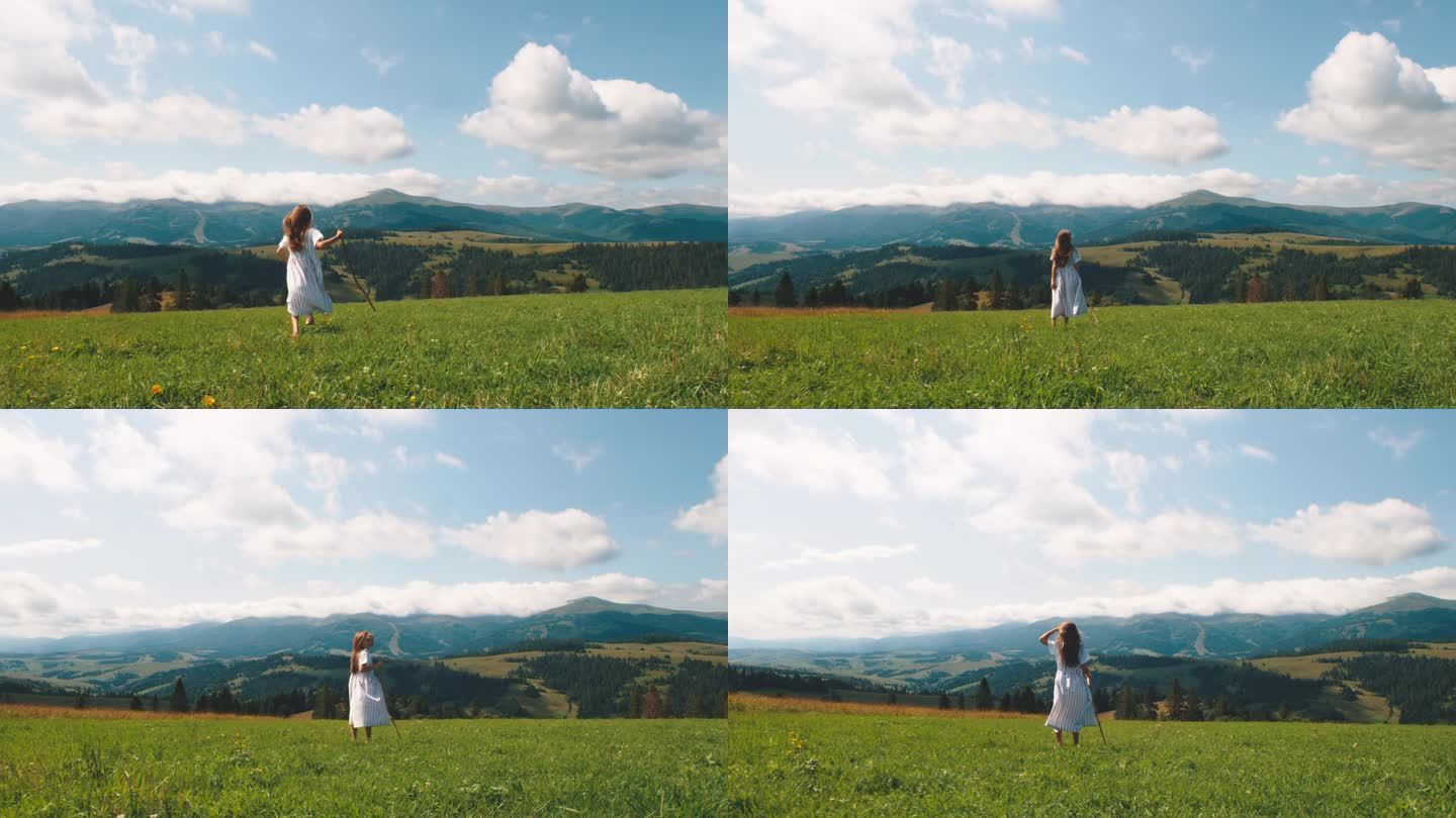 女孩在田野里奔跑，欣赏群山