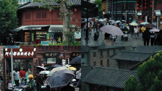 雨中的昆明老街游客