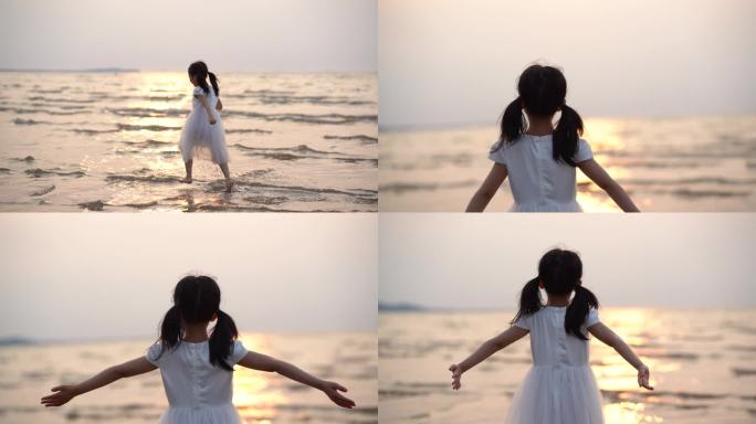 小女孩海边奔跑