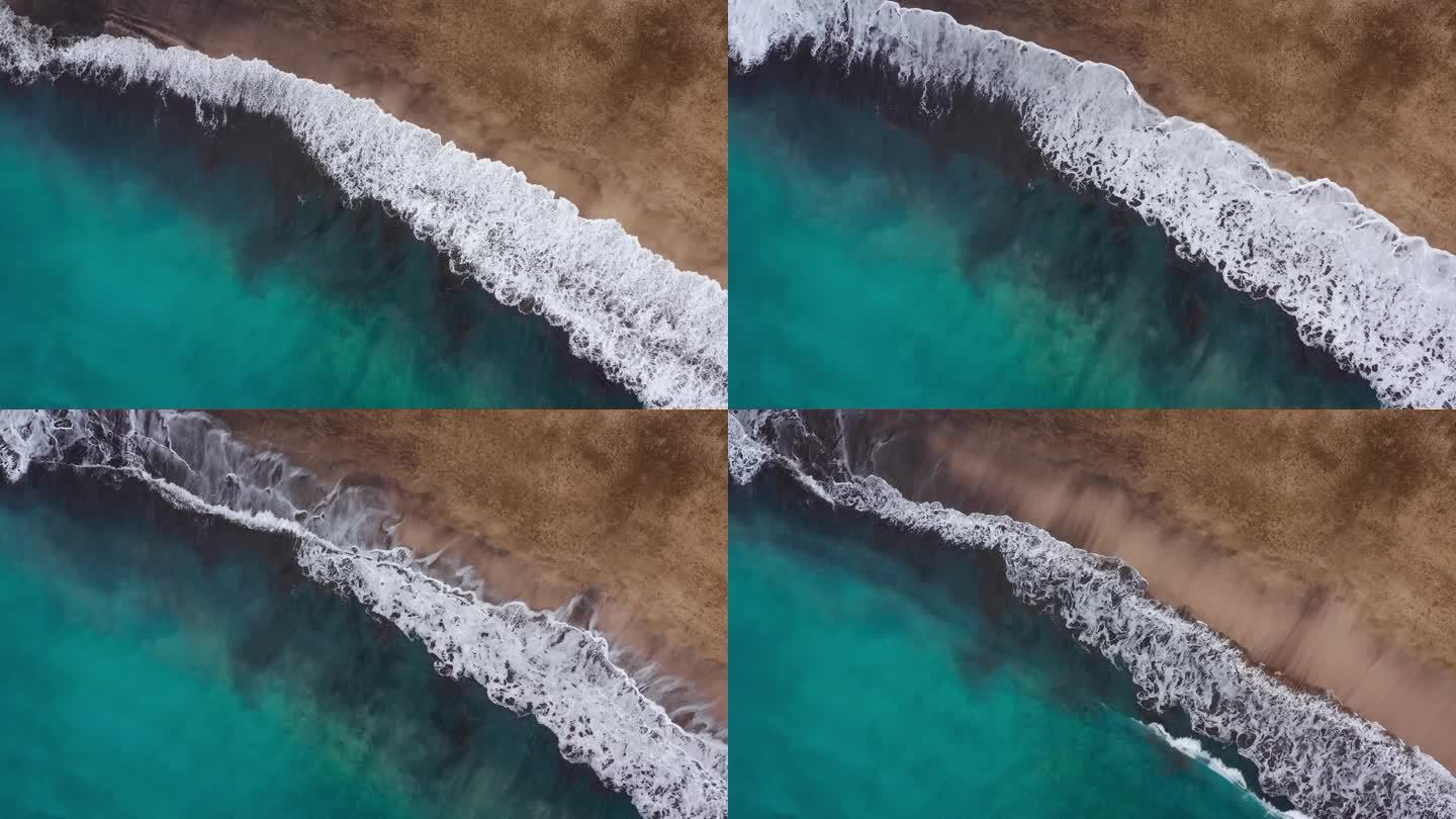 大西洋沙漠海滩的俯瞰.特内里菲岛的海岸空中无人驾驶飞机拍摄的海浪到达海岸的镜头