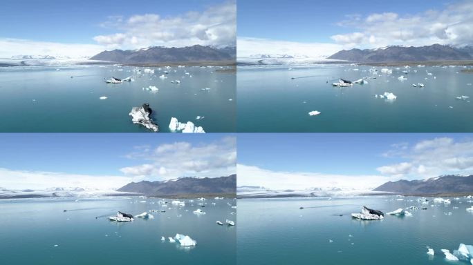 冰川人在冰原的水中大块的冰山，从Jokulsarlon冰岛的无人驾驶飞机上俯瞰，2021年2月