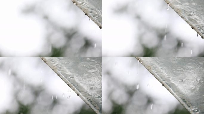 雨打在阳光房玻璃顶上