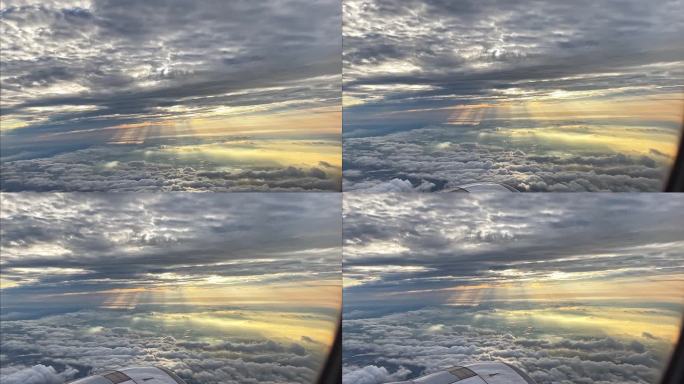 飞机窗外 云层 天空 归途 丁达尔
