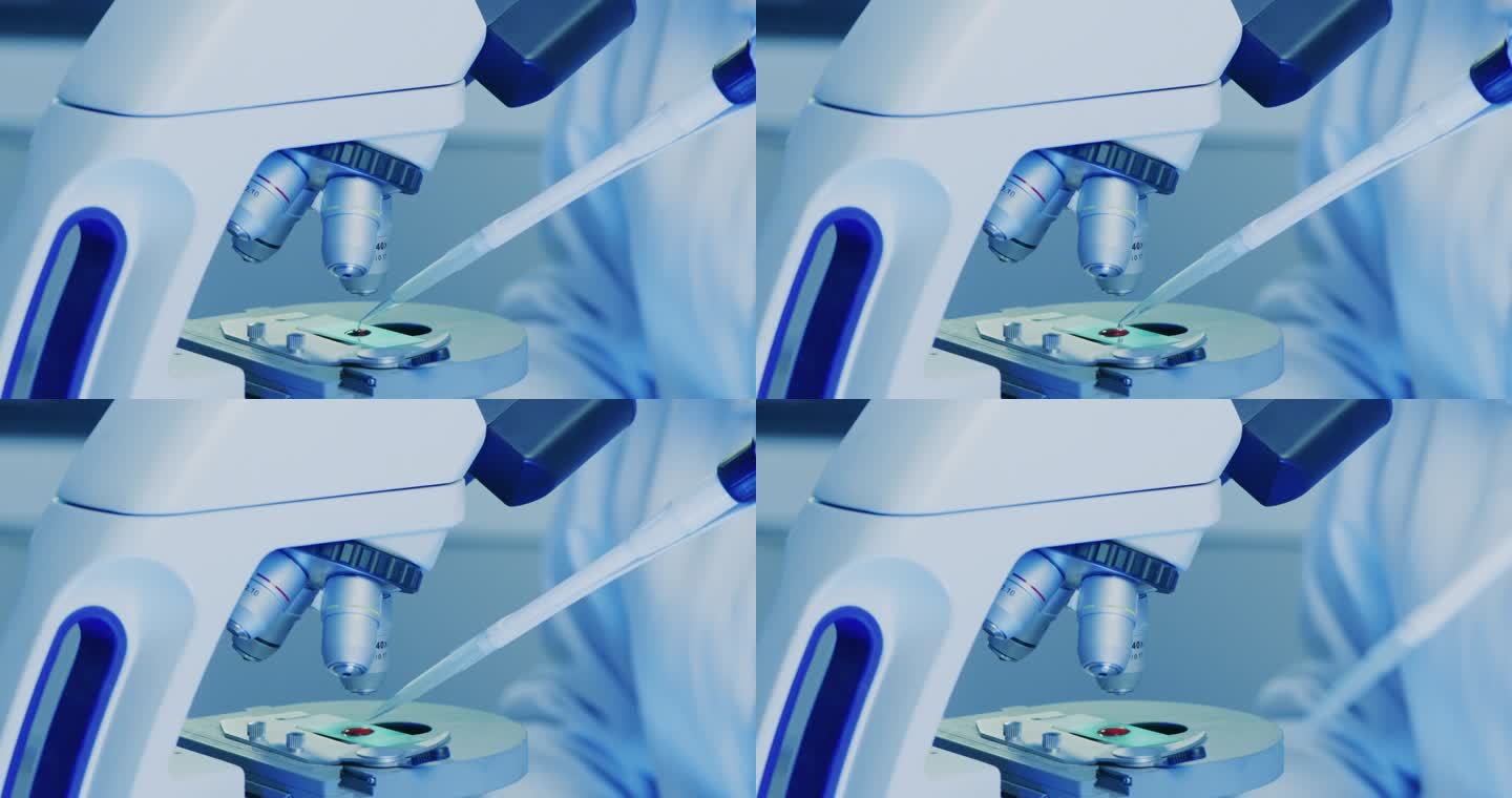 显微镜下玻璃板上血样的特写镜头。科学家使用移液器注射器将液体添加到现代测试设备中。生物学家在医学化学