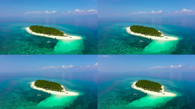 平静的海滩风景。奇异的热带海滩景观，白色沙滩和令人惊奇的绿松石海。菲律宾Digyo岛。
