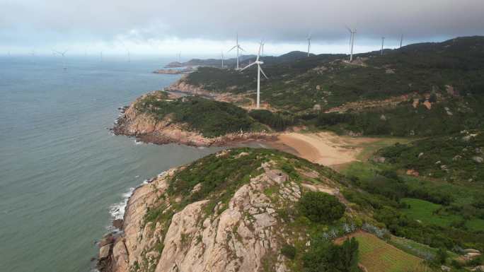 4k海岛沙滩风力发电航拍