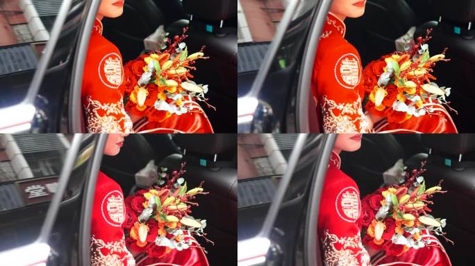 中式新娘子拿着鲜花在汽车里