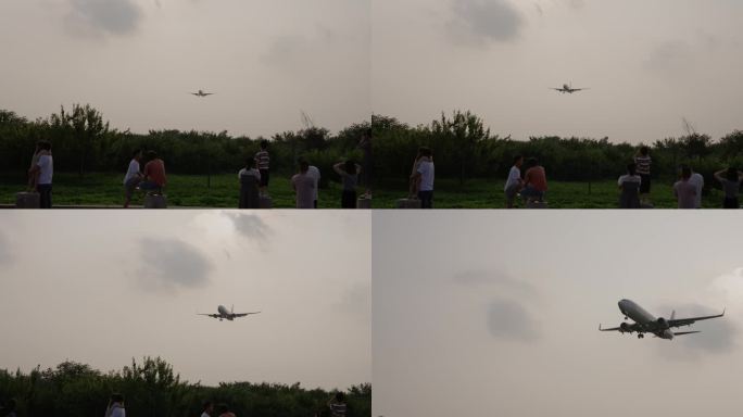 近距离拍摄飞机划过头顶飞机降落