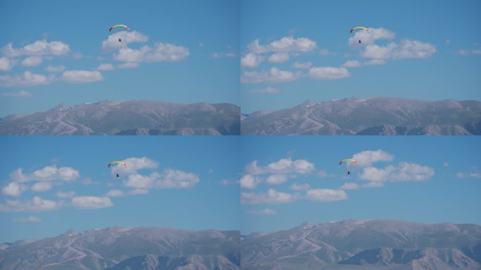 4K正版-蓝天白云下的滑翔伞02