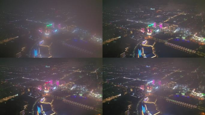 航拍平流雾云层下扬州明月湖五彩世界夜景