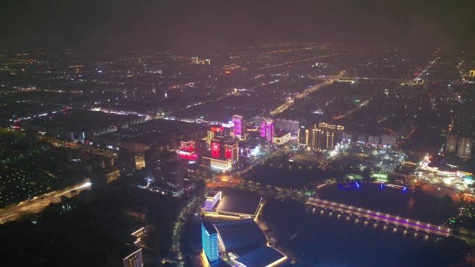 航拍平流雾云层下扬州明月湖五彩世界夜景