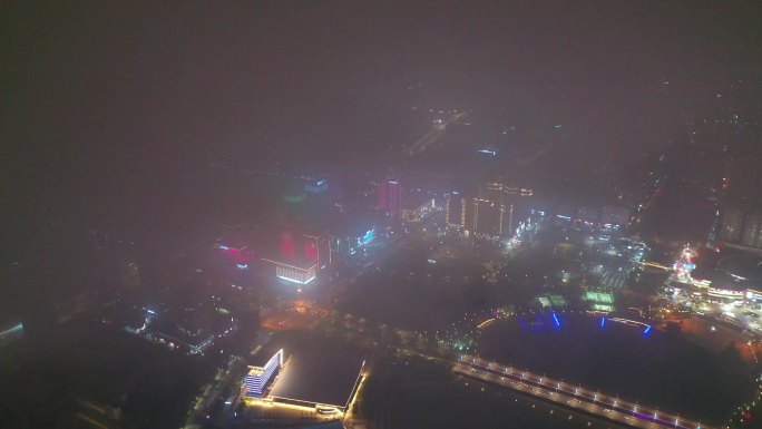 航拍平流雾云层下扬州明月湖五彩世界夜景