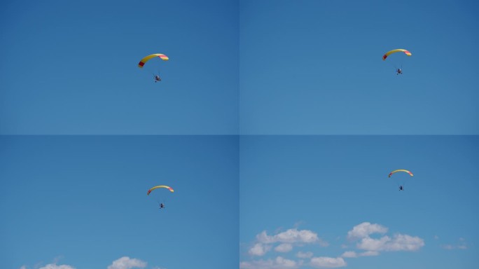4K正版-蓝天白云下的滑翔伞01