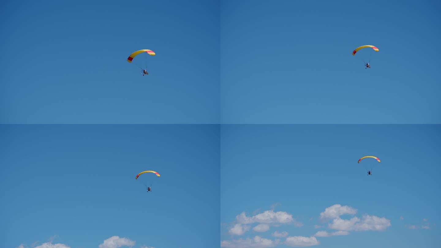 4K正版-蓝天白云下的滑翔伞01