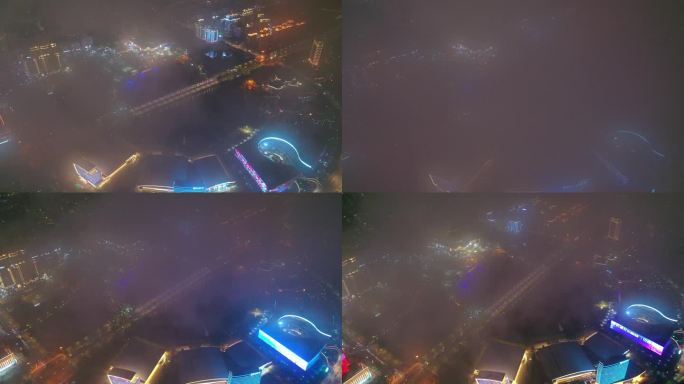 航拍平流雾云层下扬州明月湖五彩世界夜景