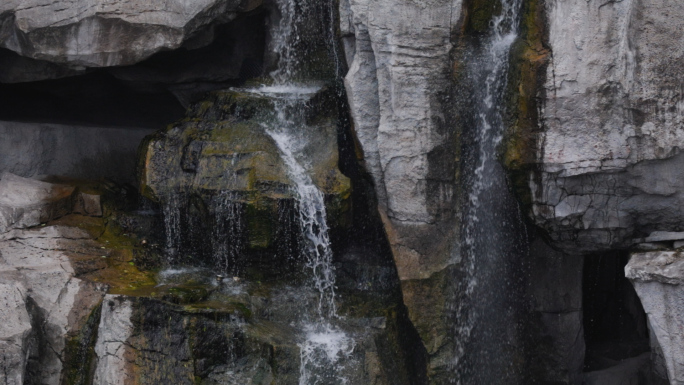 景区公园石山溪流瀑布景观设计流水升格空镜