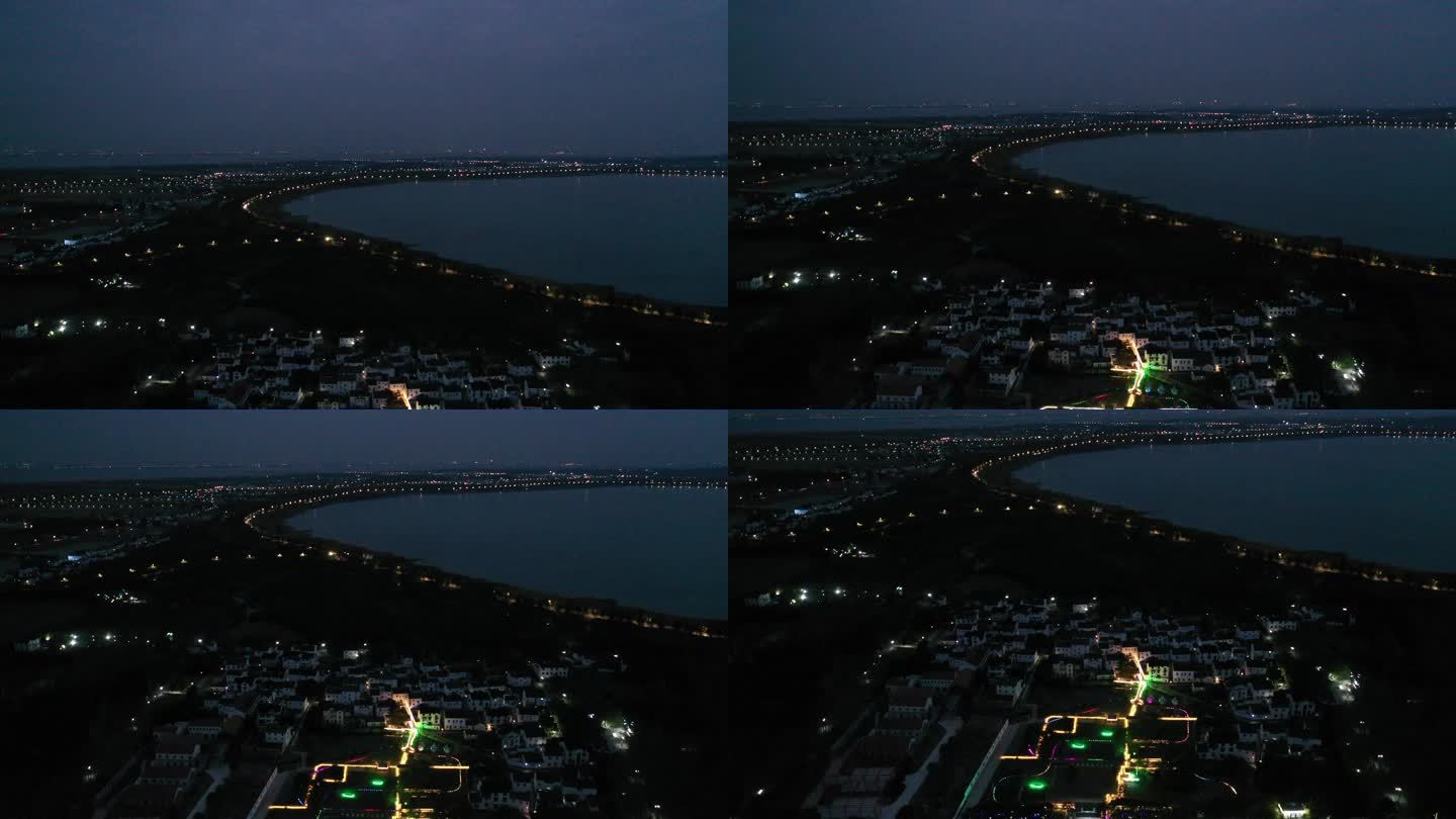 高空俯瞰下的夜晚的太湖边灯光点点