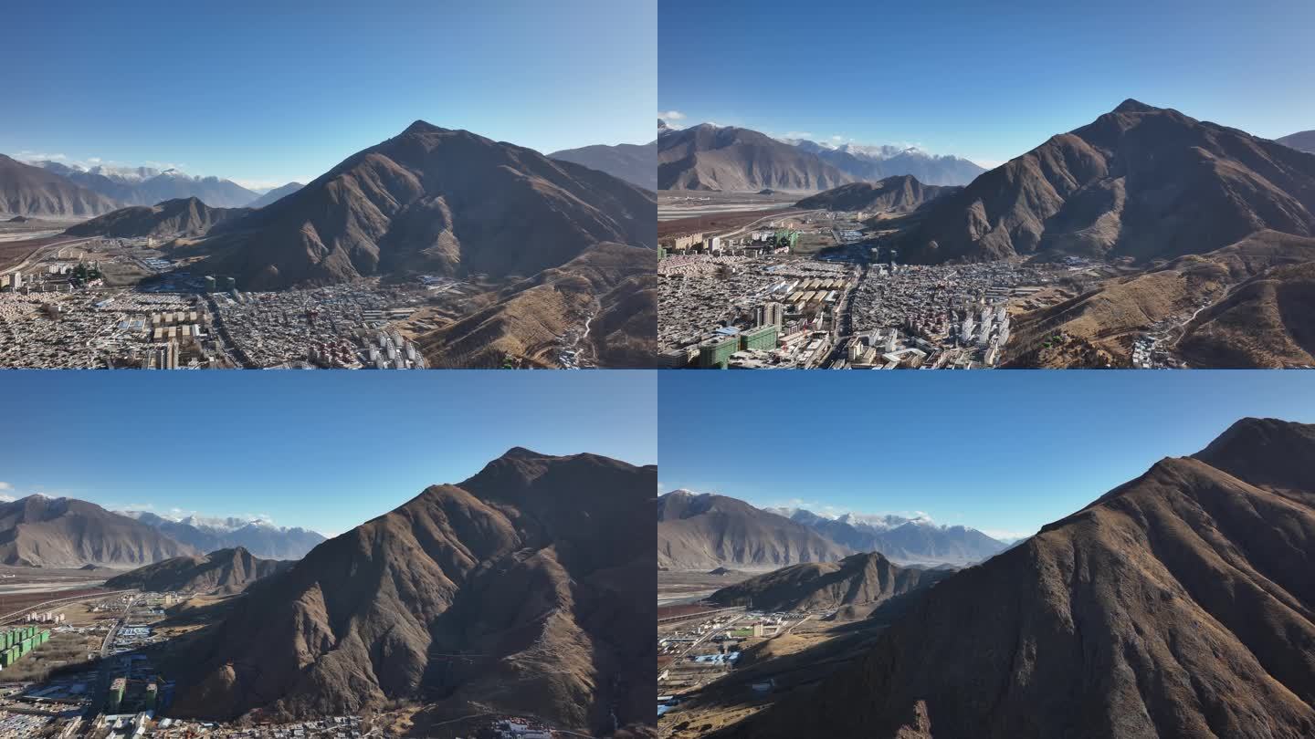 西藏山南航拍全景 群山环绕的高原城市